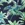 Tommy Bahama Women's Art of Palms Reversible Lace Back One Piece Swimsuit - Image 5